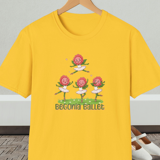 Bright yellow t-shirt with 'Begonia Ballet' design, on a hanger against a white wall.