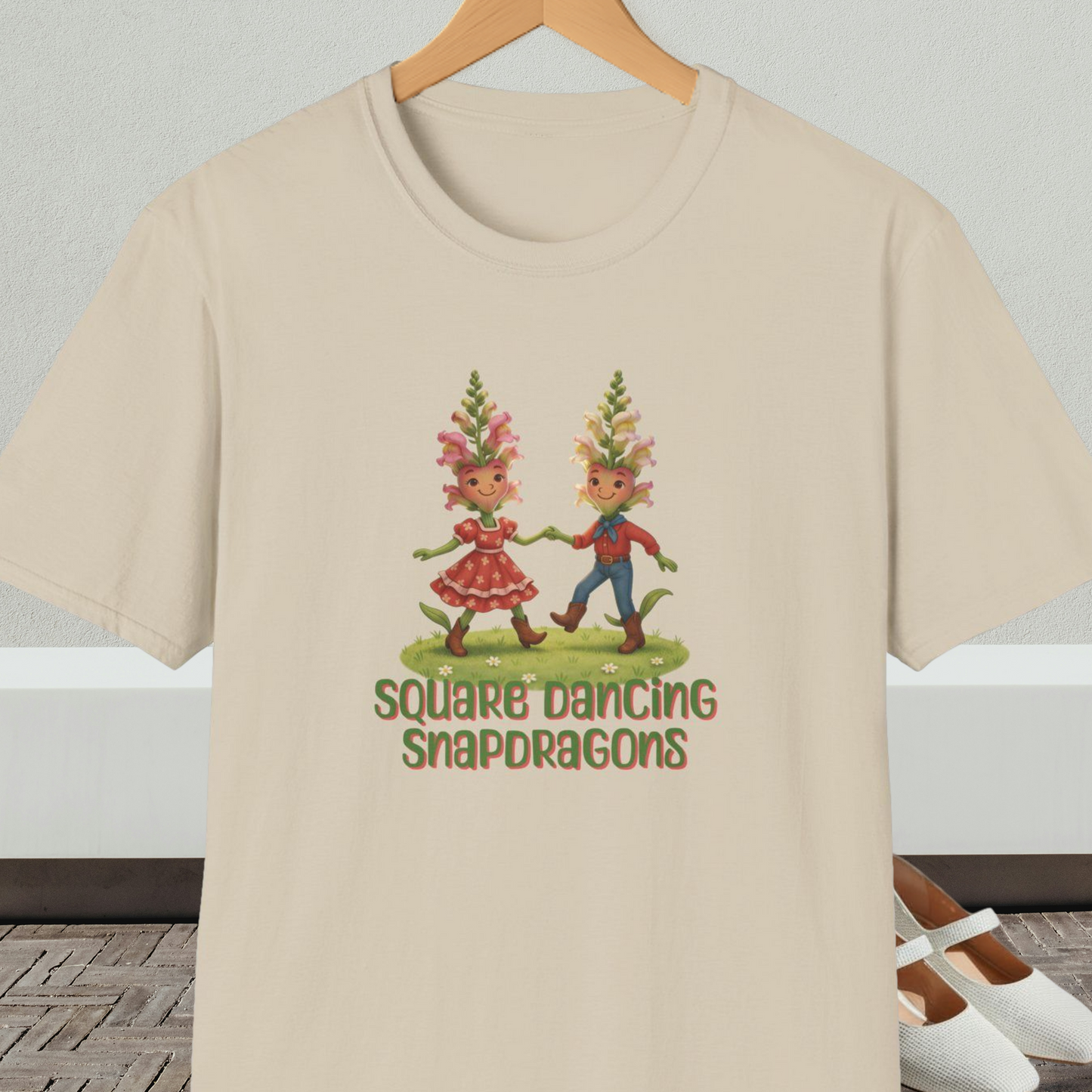 Beige t-shirt with 'Square Dancing Snapdragons' cartoon design and text
