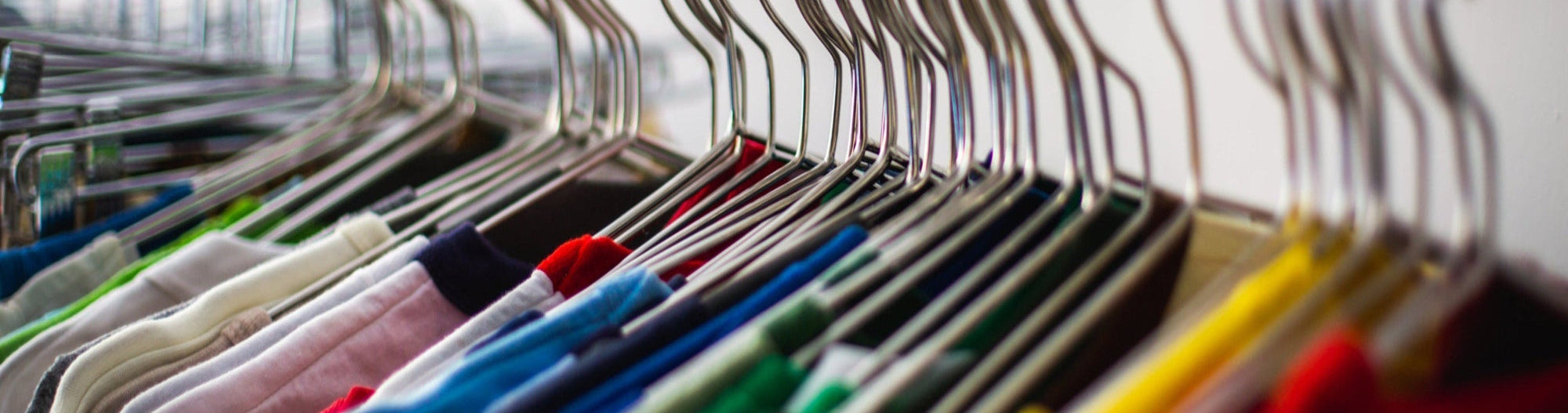 colorful shirts on hangers