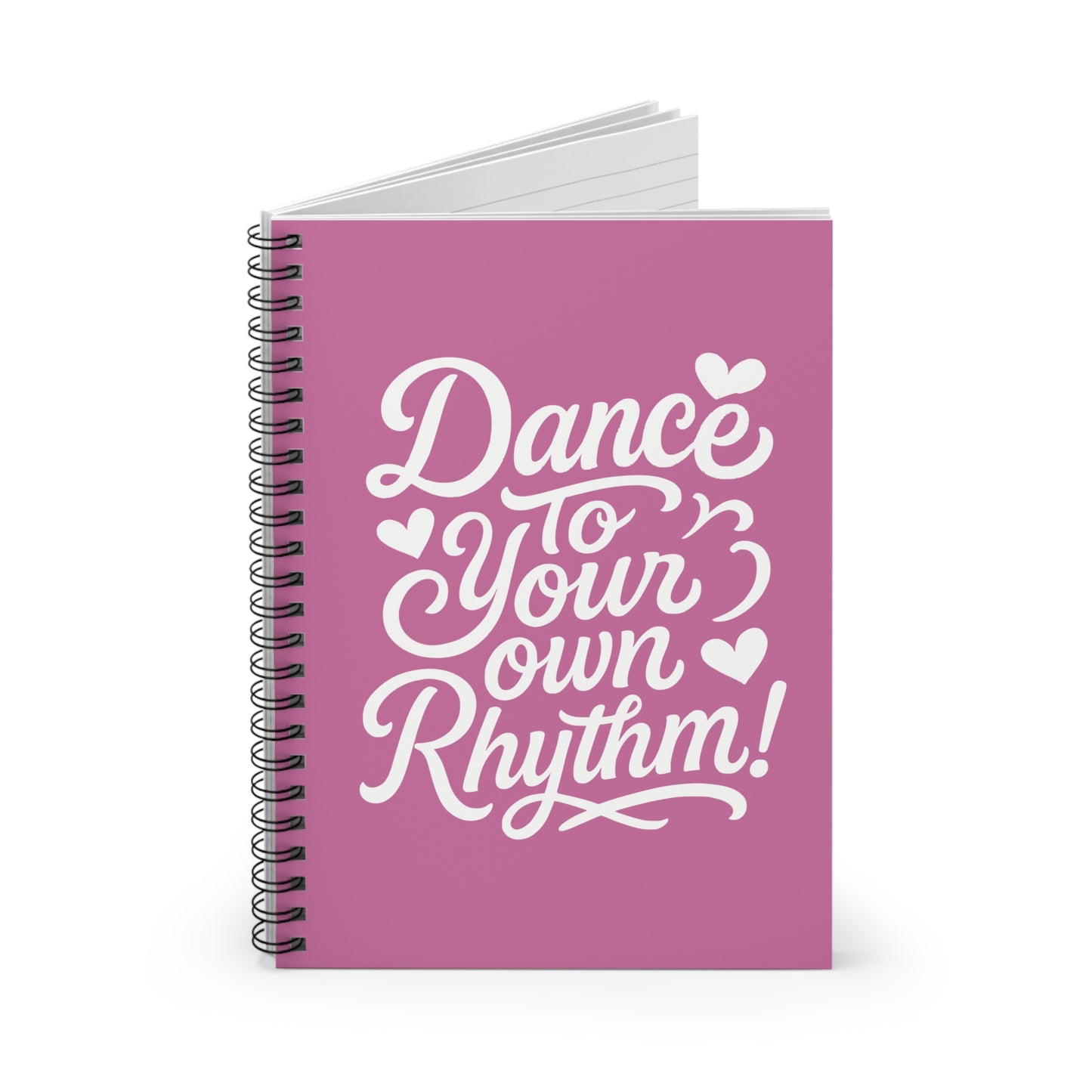 Pink notebook with 'Dance to Your Own Rhythm!' text in white letters