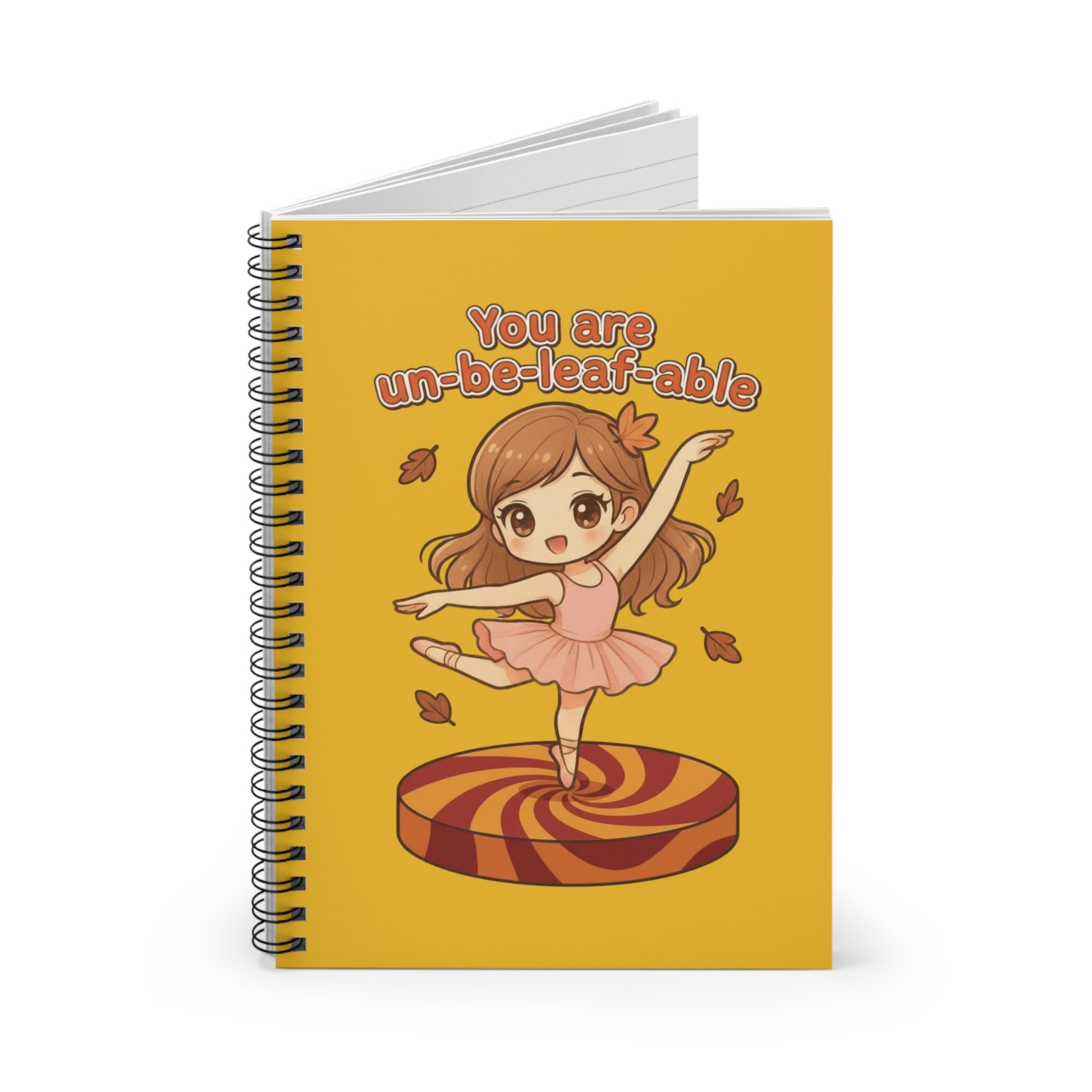 Notebook with a cartoon ballerina on a yellow background, featuring the text 'You are un-be-leaf-able'.