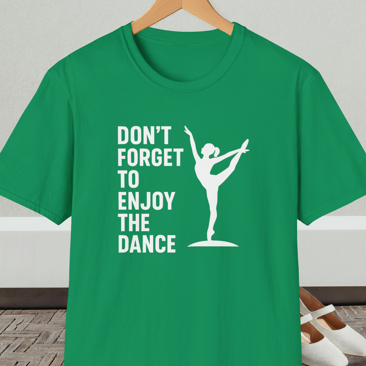 Kelly green t-shirt with a white silhouette of a dancer and text 'Don't Forget to Enjoy the Dance'