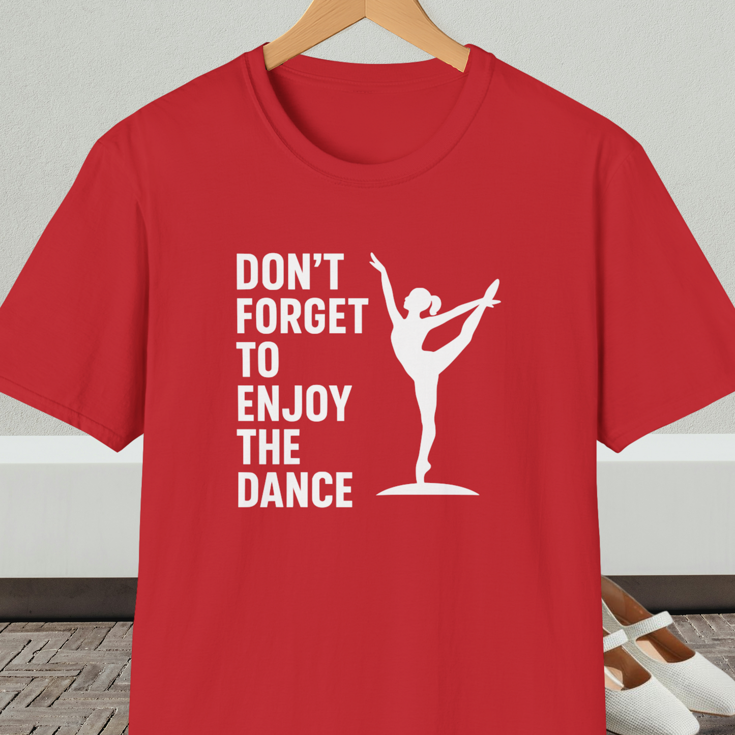 Red t-shirt with a white silhouette of a dancer and text 'Don't Forget to Enjoy the Dance'