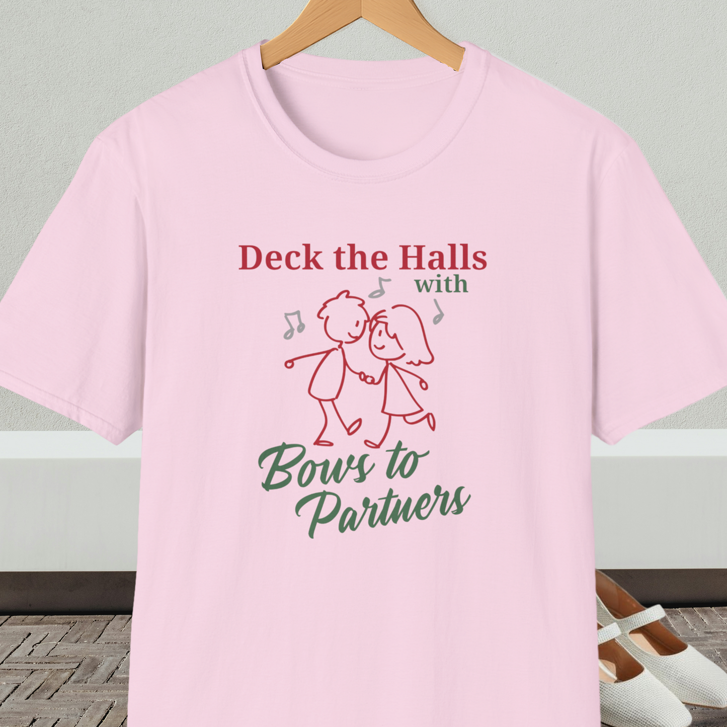 Pink tee shirt with a square dance couple and the words 'Deck the Halls with Bows to Partners'