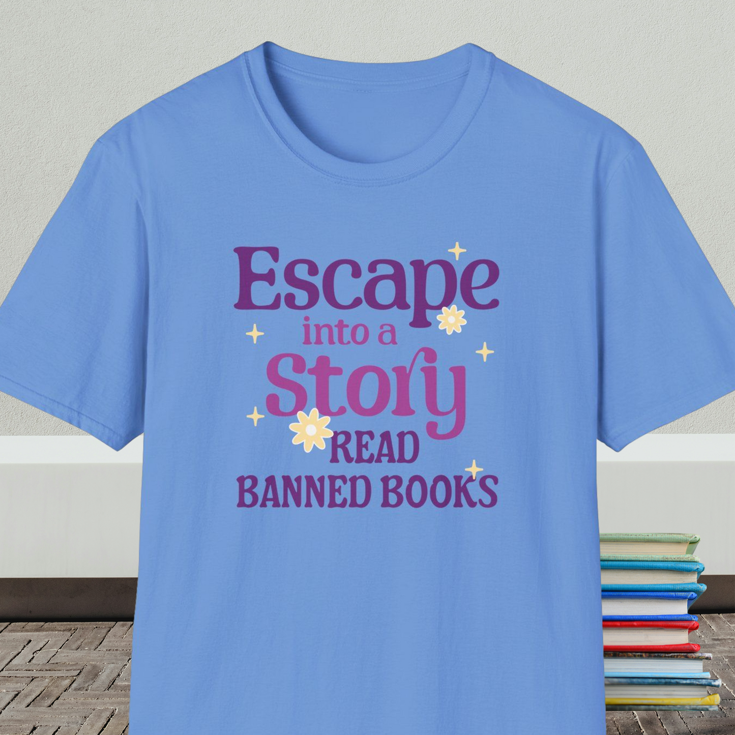 Blue t-shirt with text 'Escape into a story, read banned books' 