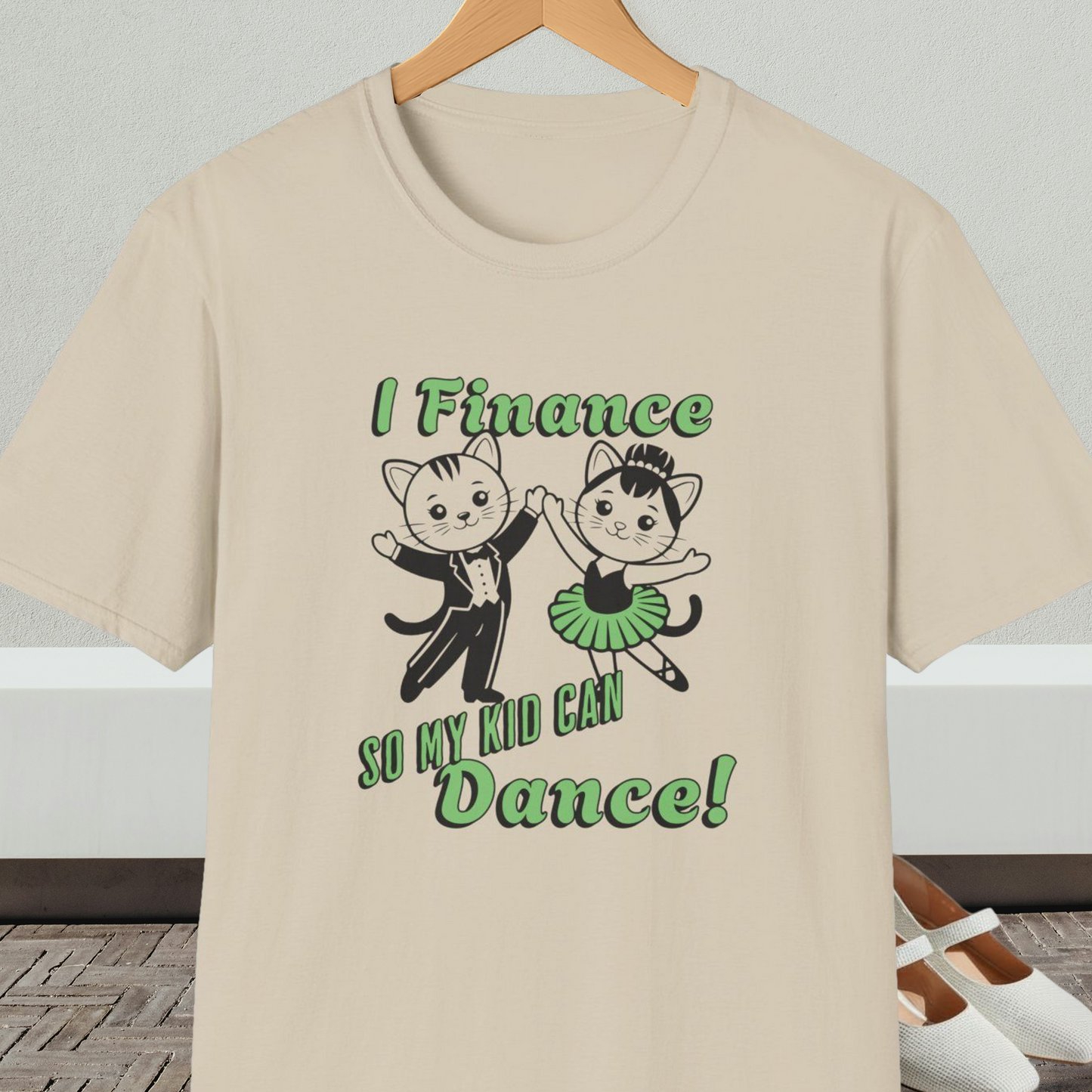 Beige t-shirt with cartoon cats dancing and 'I Finance So My Kid Can Dance' text 