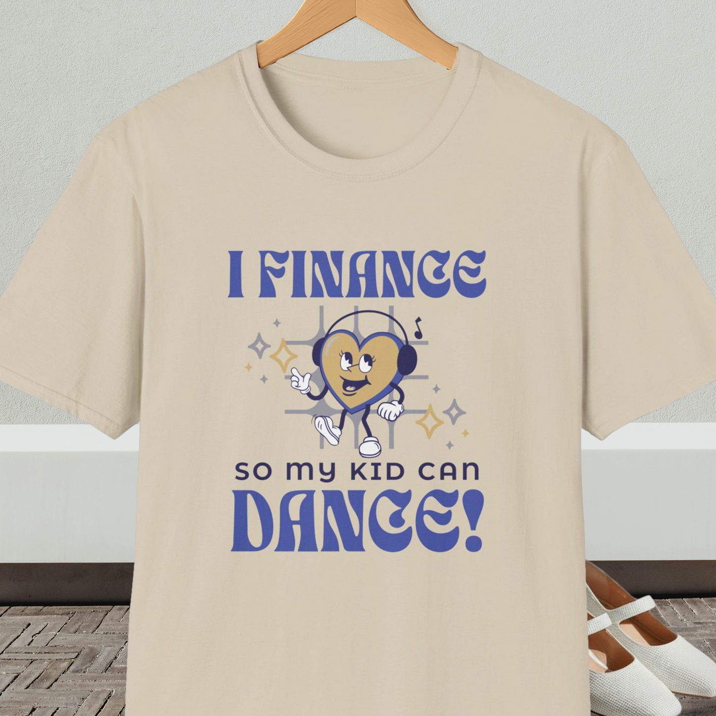Beige t-shirt with a dancing heart cartoon and text 'I Finance So My Kid Can Dance!'