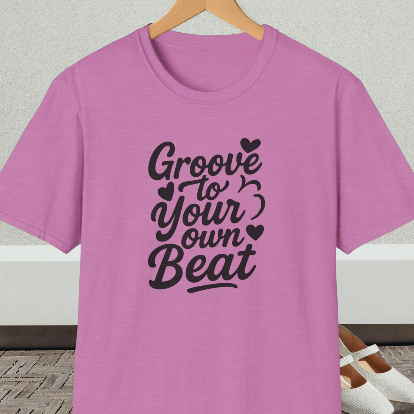 Orchid tee shirt with 'Groove to Your own Beat' in black script letters