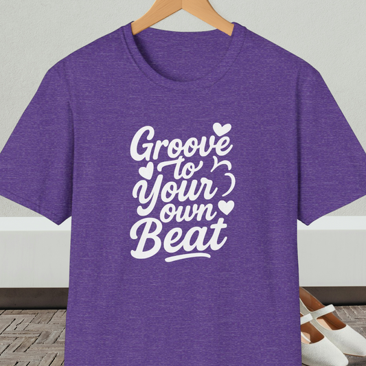 Purple tee shirt with 'Groove to Your Own Beat' text in white script