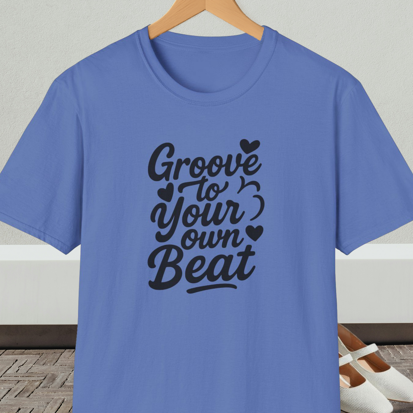 Blue tee shirt with 'Groove to Your own Beat' in black script letters
