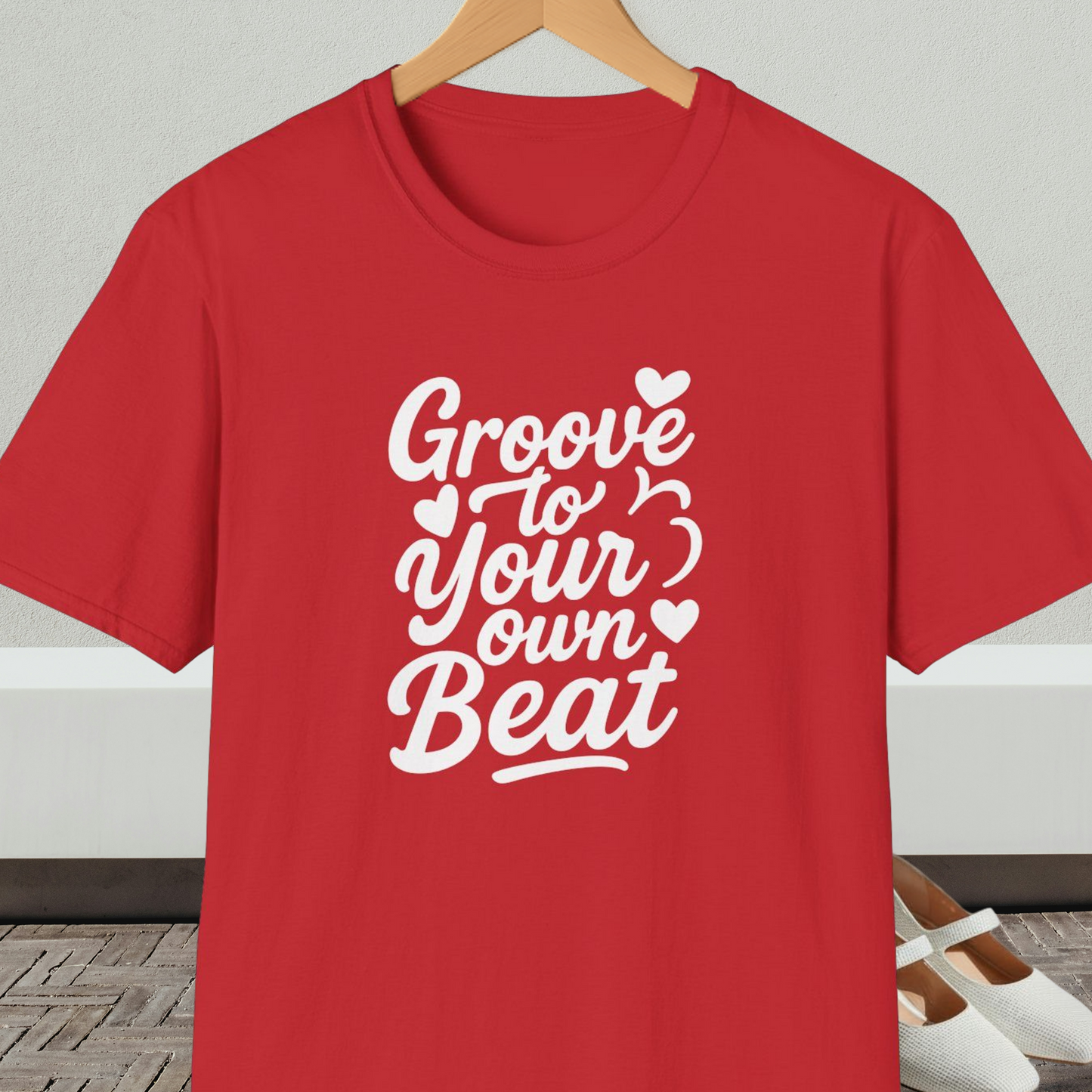 Red tee shirt with 'Groove to Your Own Beat' text in white script
