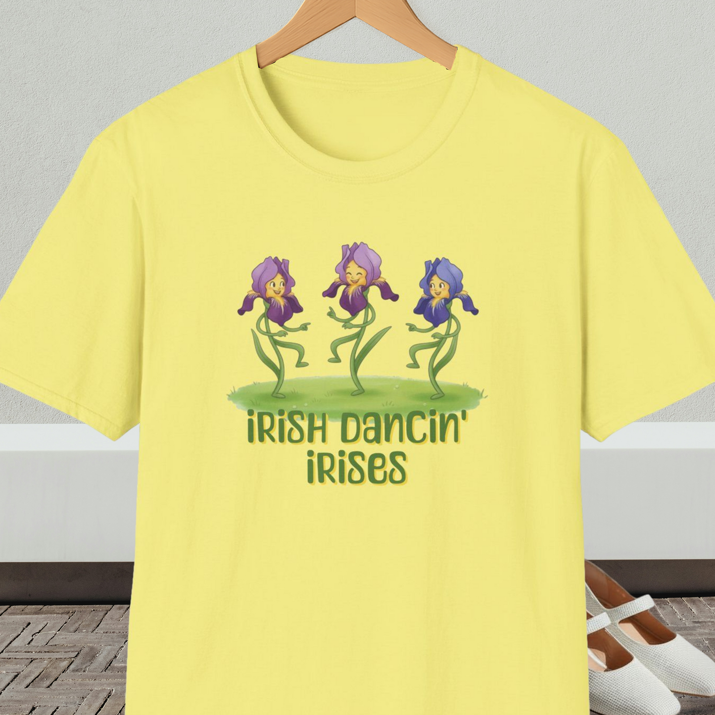 Yellow t-shirt with 'Irish Dancin Irises' text and cartoon dancing flowers design.