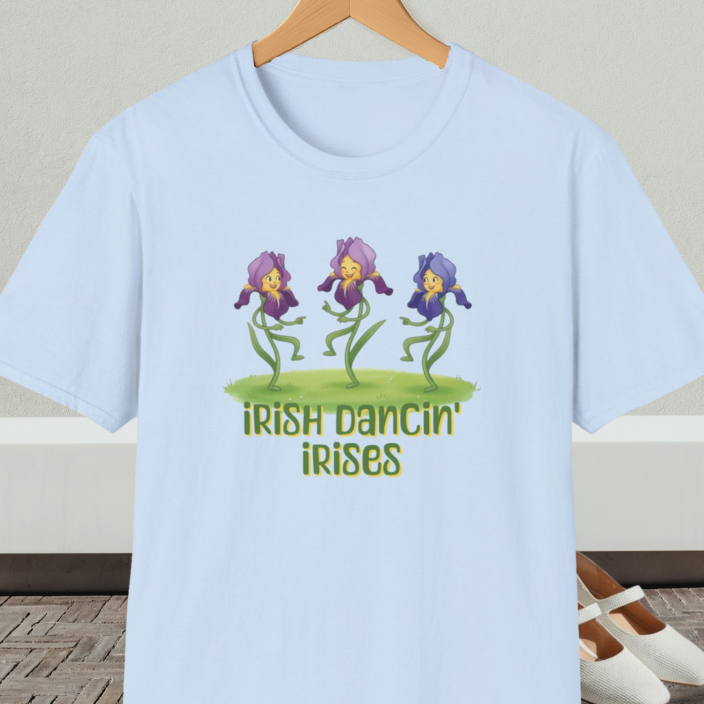 Light blue t-shirt with 'Irish Dancin Irises' text and cartoon dancing flowers design.