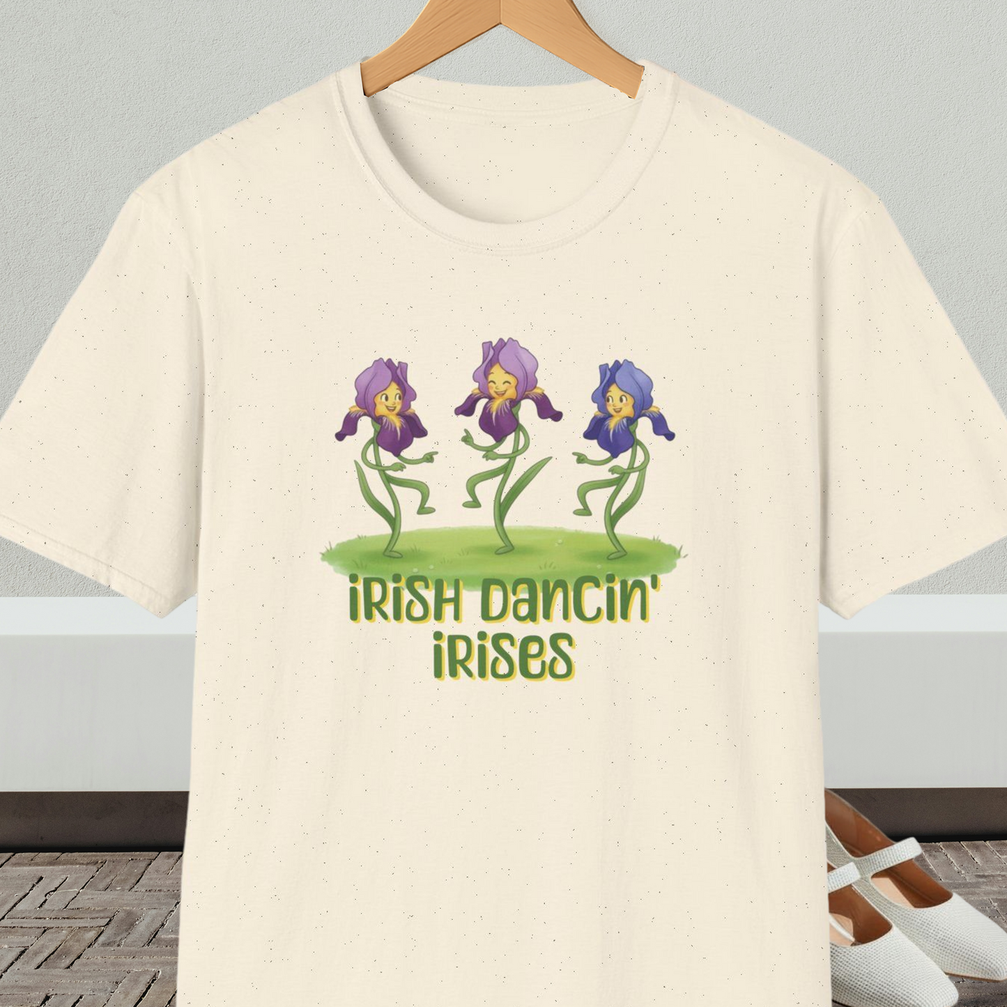 Natural beige t-shirt with 'Irish Dancin Irises' text and cartoon dancing flowers design.