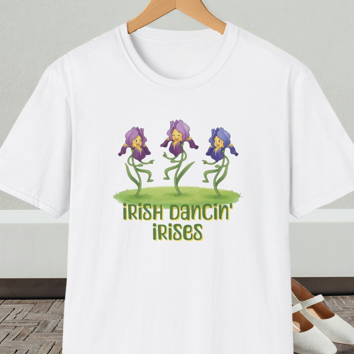 White t-shirt with 'Irish Dancin Irises' text and cartoon dancing flowers design.