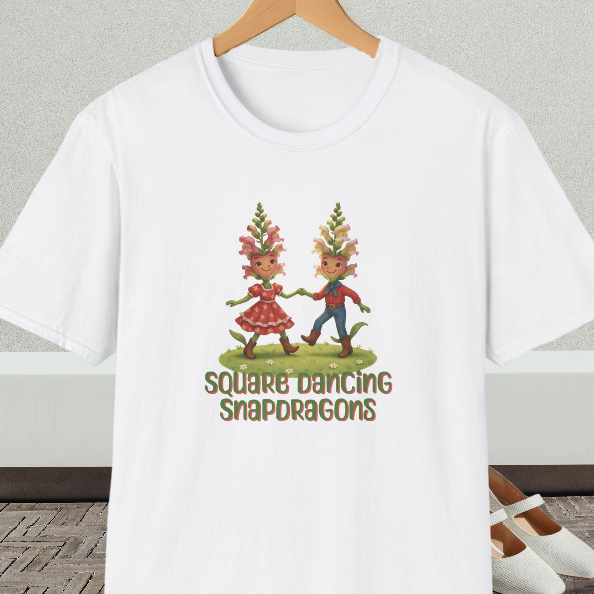 White t-shirt with 'Square Dancing Snapdragons' cartoon design and text