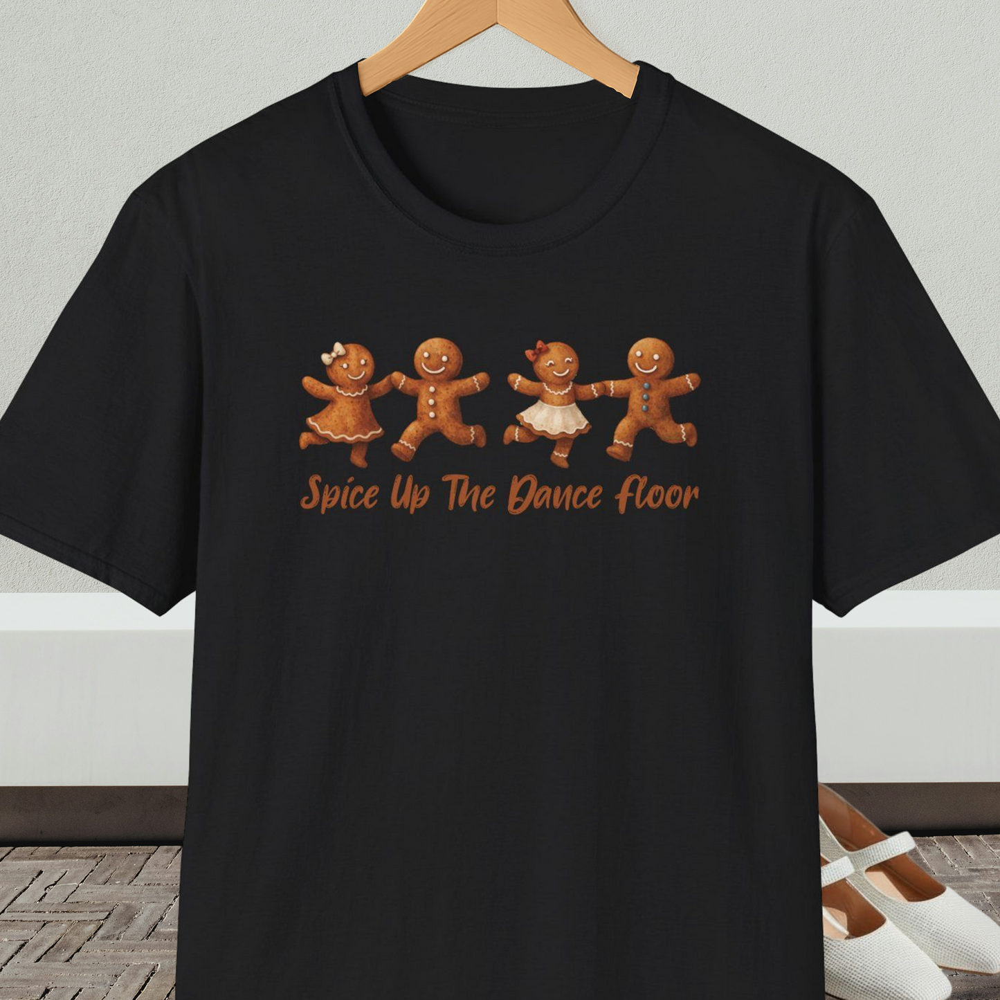 Black tee shirt with dancing gingerbread people, with the words 'Spice Up The Dance Floor'