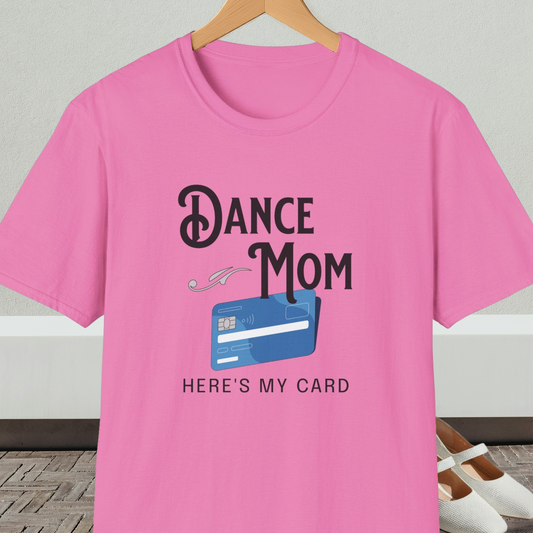 Pink t-shirt with 'Dance Mom, Here's My Card' text and credit card graphic, on a hanger with a neutral background.