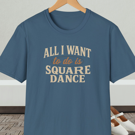 Steel blue t-shirt with text 'All I Want to do is Square Dance' on a hanger against a neutral background.